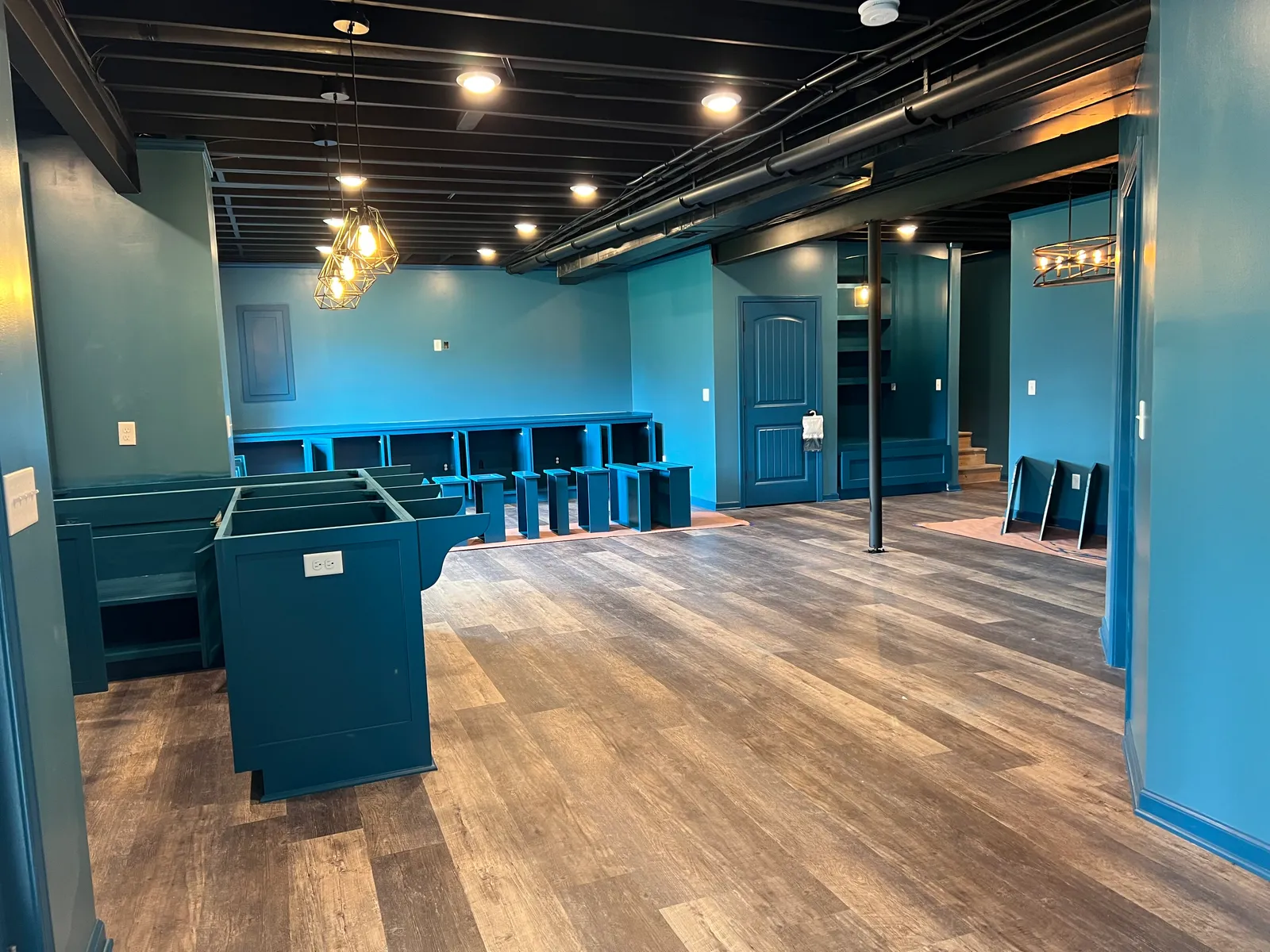 Lower level with custom cabinets and doors