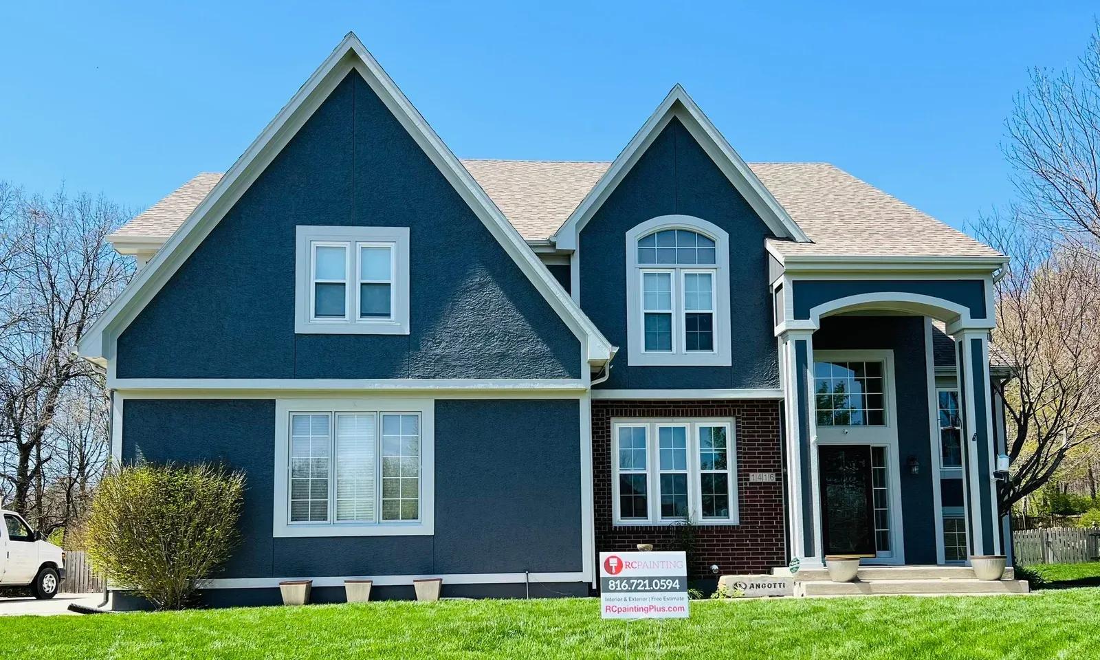 Navy blue siding home front view